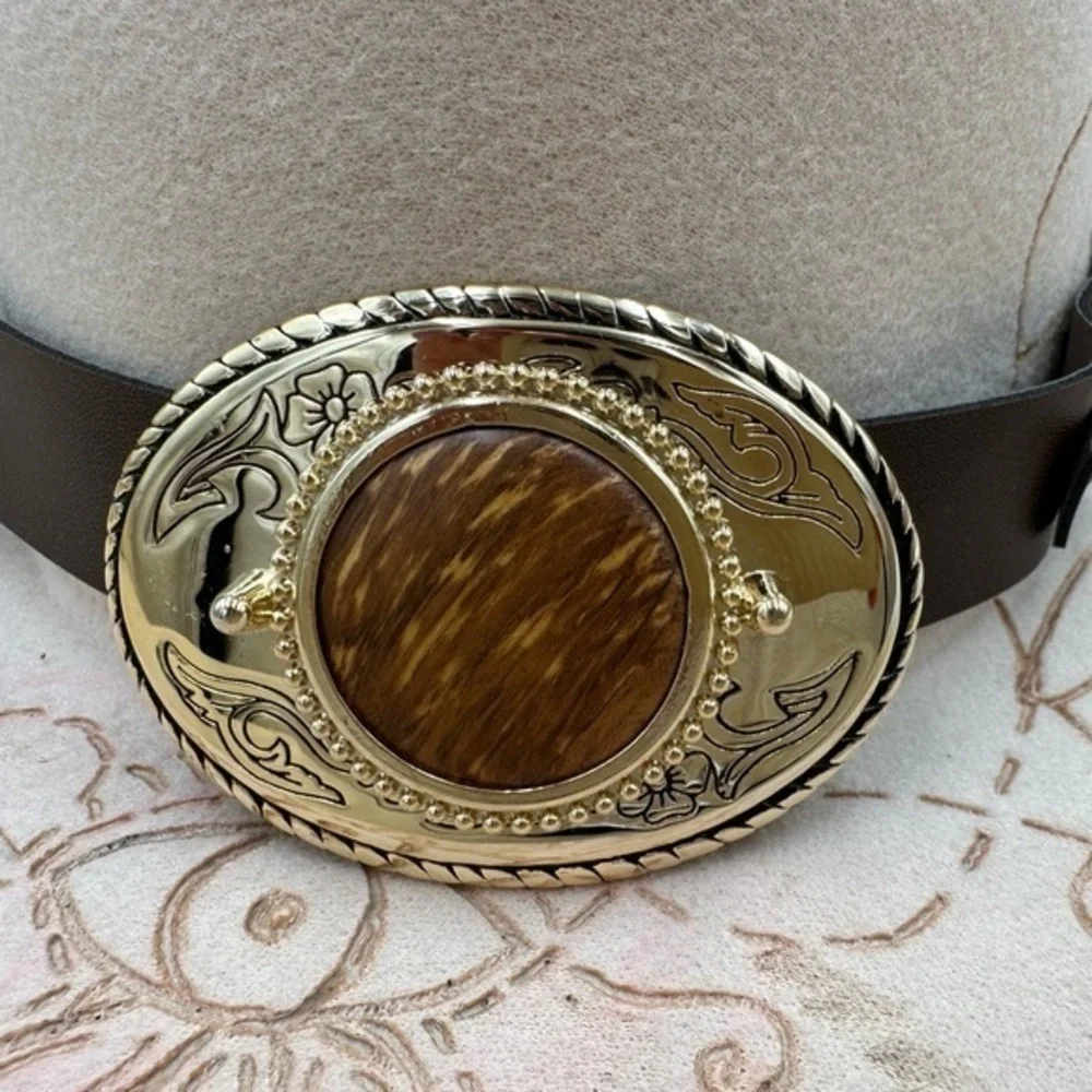 Oregon myrtle wood belt buckle. Nice and heavy.